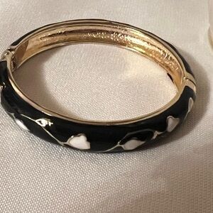 Jiu Long Xing black and white enamel hinged bangle bracelet gold accents